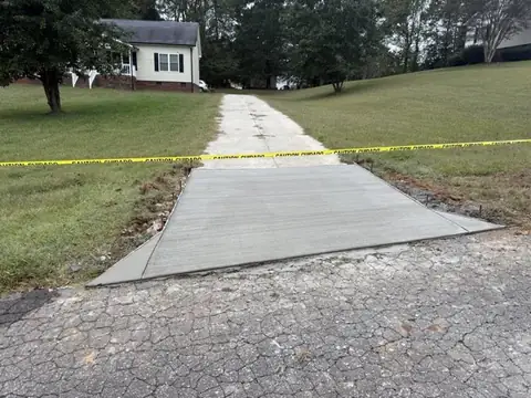 Concrete driveway apron and approach