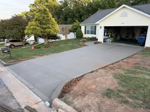 Fresh concrete driveway at a ranch home
