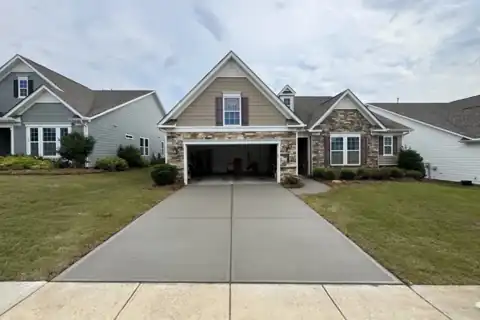 Finished concrete driveway at a Charlotte-area craftsman home