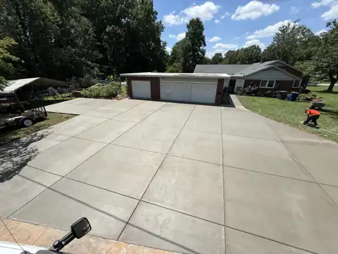 Triple-garage concrete apron and driveway