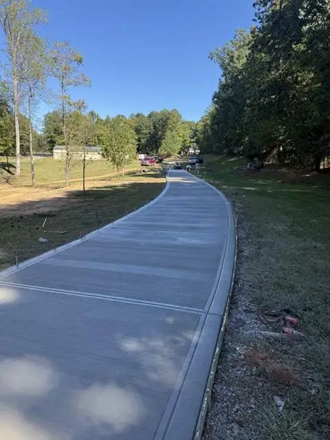Long concrete driveway, broom finish