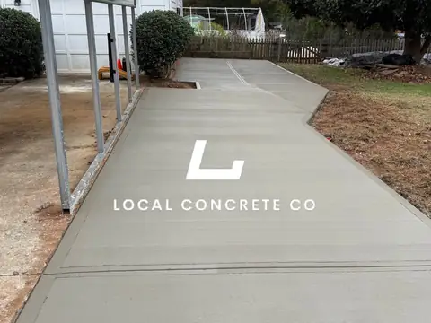 Concrete parking and equipment pad