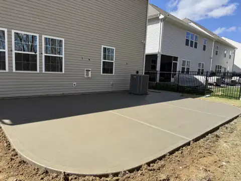 Large broom-finish patio at a new build