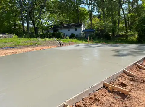 Large concrete foundation slab pour in progress