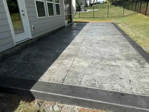 Stamped ashlar concrete patio, charcoal